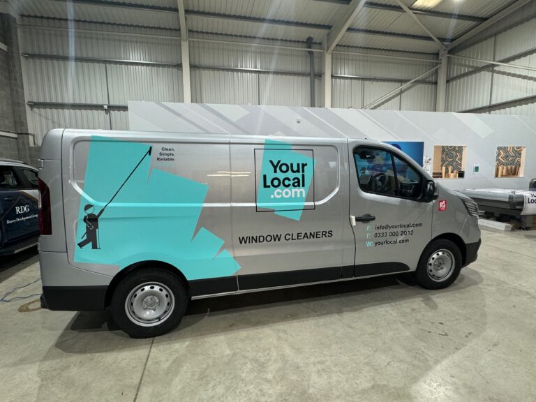 Branded company van with custom fleet graphics designed to generate leads